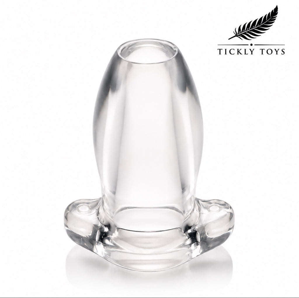 A clear glass adult novelty product with a flared base, photographed on a white background with the Tickly Toys logo in the top right corner.