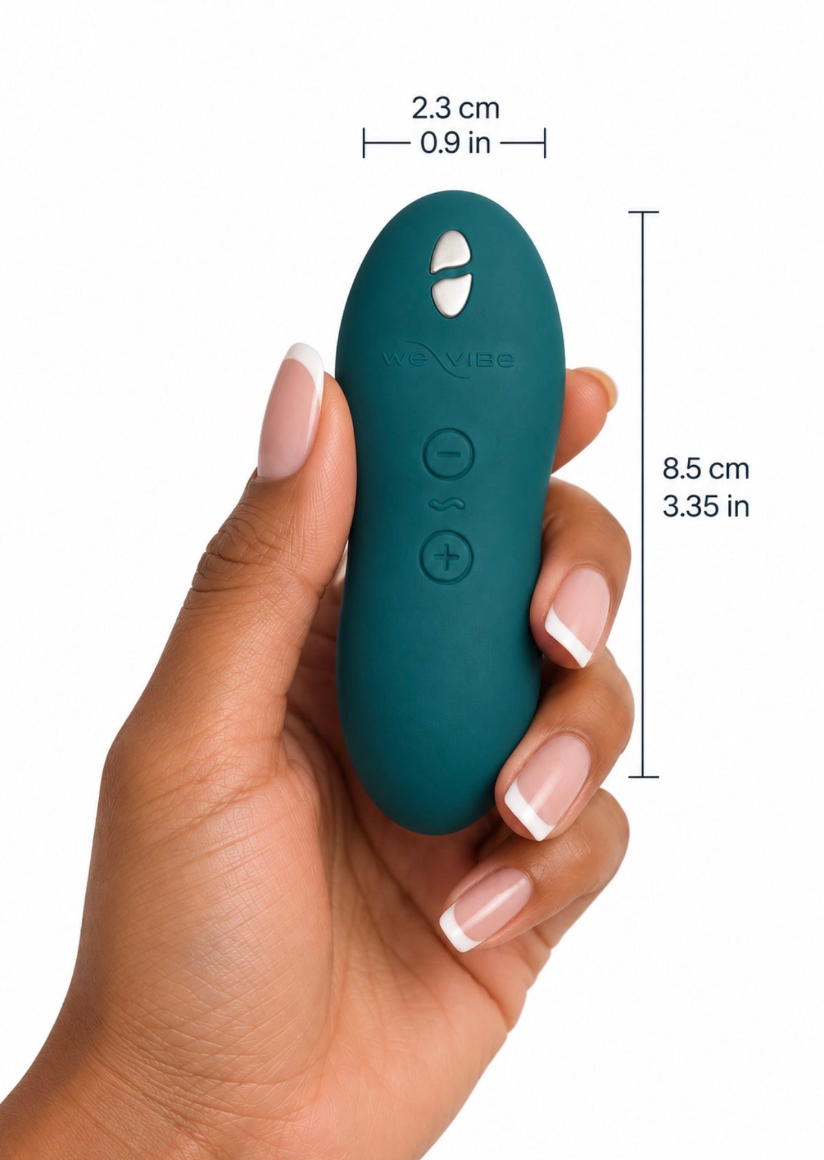 A hand with a French manicure holds a teal Vibe mini vibrator against a white background, with dimension lines showing its height of 8.5 cm (3.