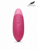 A pink electronic personal massager with a smooth, rounded design and three control buttons on the front, shown against a plain white background with the Tickly Toys brand logo in the top right corner.