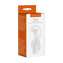 A boxed white flexible hair extension or wig piece shown on a plain white background. The retail box is mostly white with orange side panels and a small orange tab at the top.